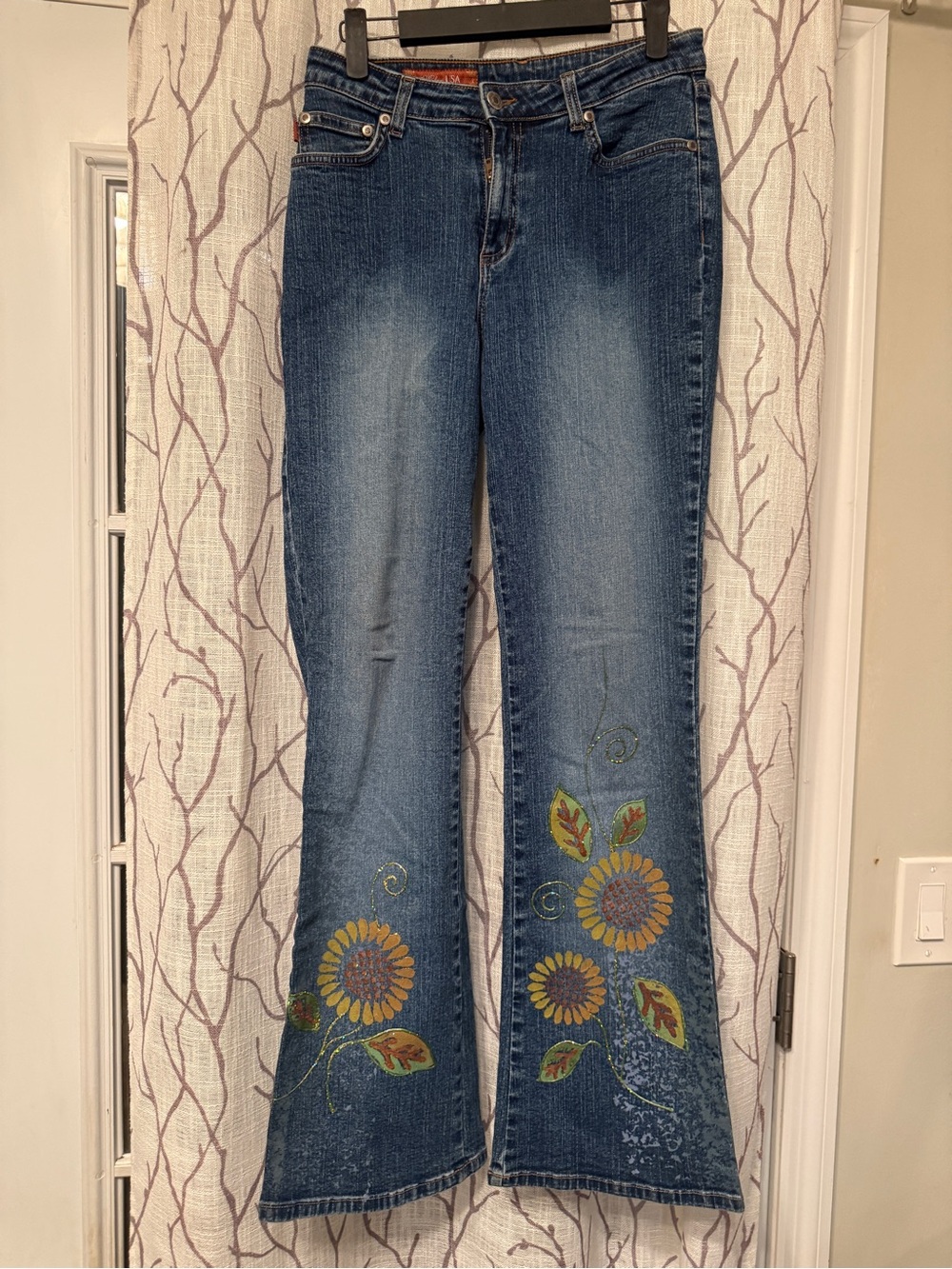 Blue Embroidered Flare Jeans with Sunflower Motif